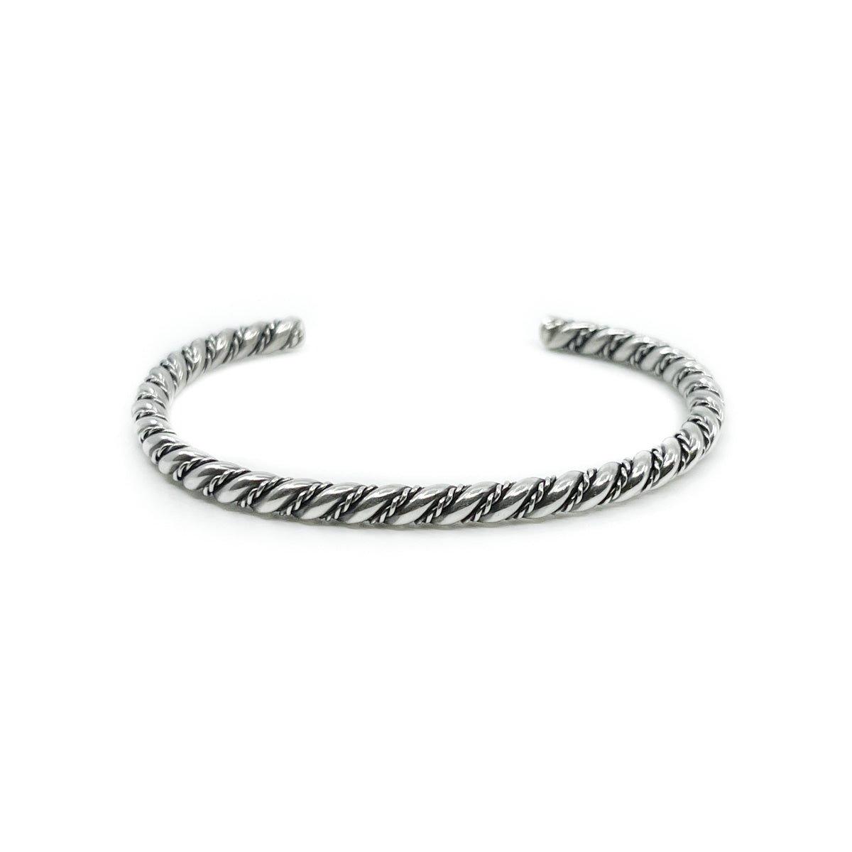 Sterling silver twist bracelet, heavy gauge silver By Diné silversmith, Carlyn Tahe Alternating heavy gauge silver wire with narrow silver wire Fits small to average wrists, 6 inches around plus 1 inch opening Somewhat flexible, great for stacking multiples!  *All sales on jewelry are final. No returns or exchanges