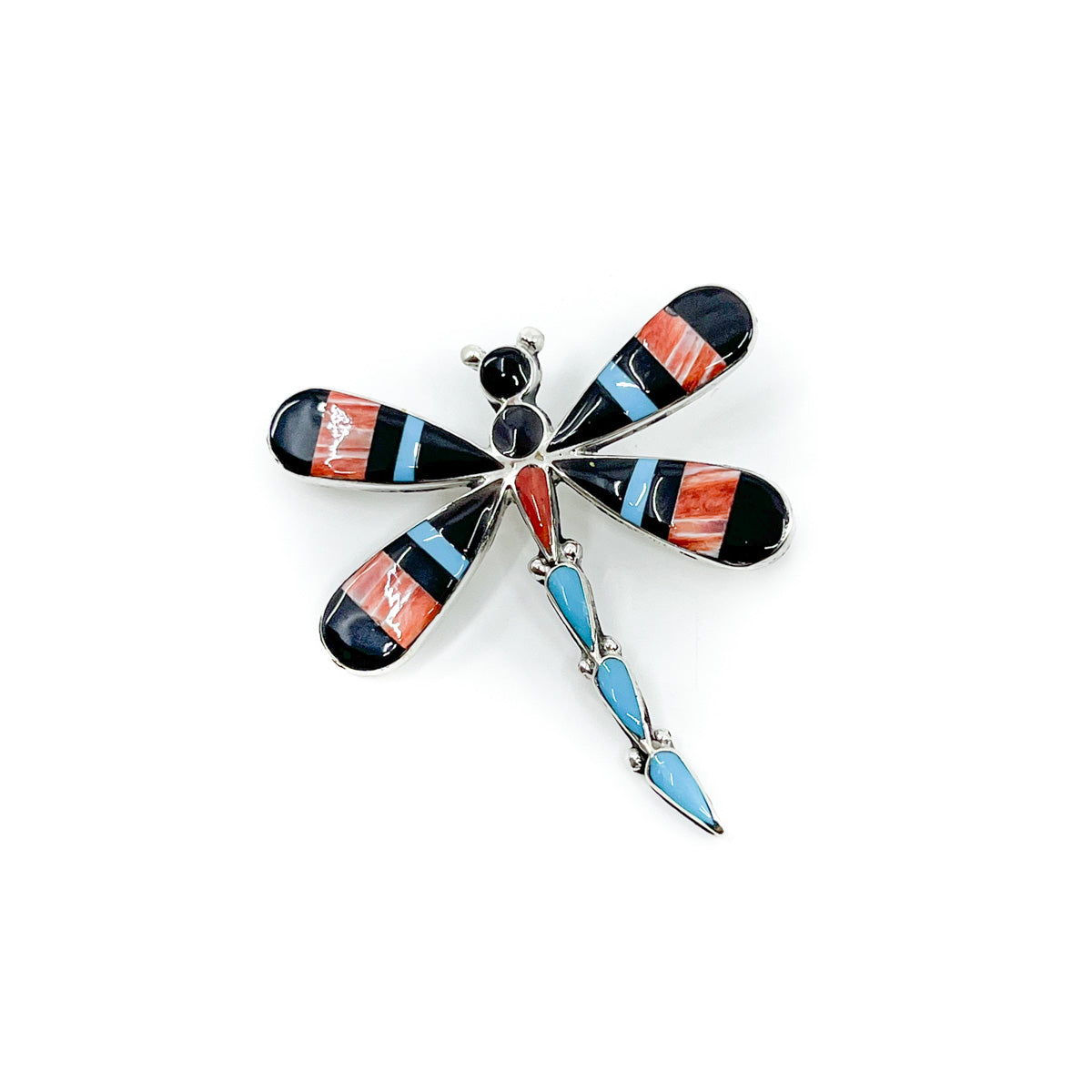 Dragonfly pin/pendant handcrafted in Zuni mosaic inlay  By Atonette Ahiyite, signed on back Spiny oyster shell, jet, turquoise, and coral Hand cut stones set in sterling silver bezel