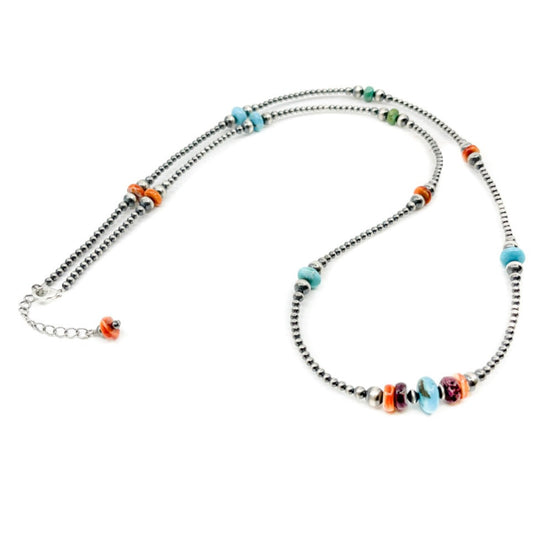 Handcrafted Silver bead & Heishe necklace Sterling Silver beads with Turquoise and Orange & Purple Spiny Oyster Shell Heishe beads Sterling Silver lobster claw clasp Measures approximately 32 inches long with 2 inch extender *All sales on jewelry are final. No returns or exchanges