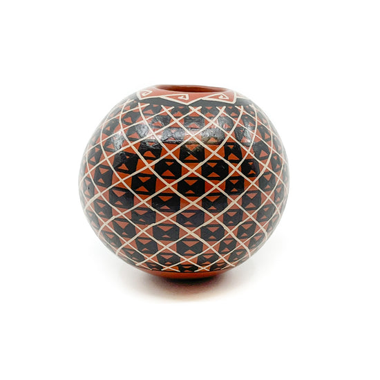 Black and White Geometric Seed Pot on Red Clay