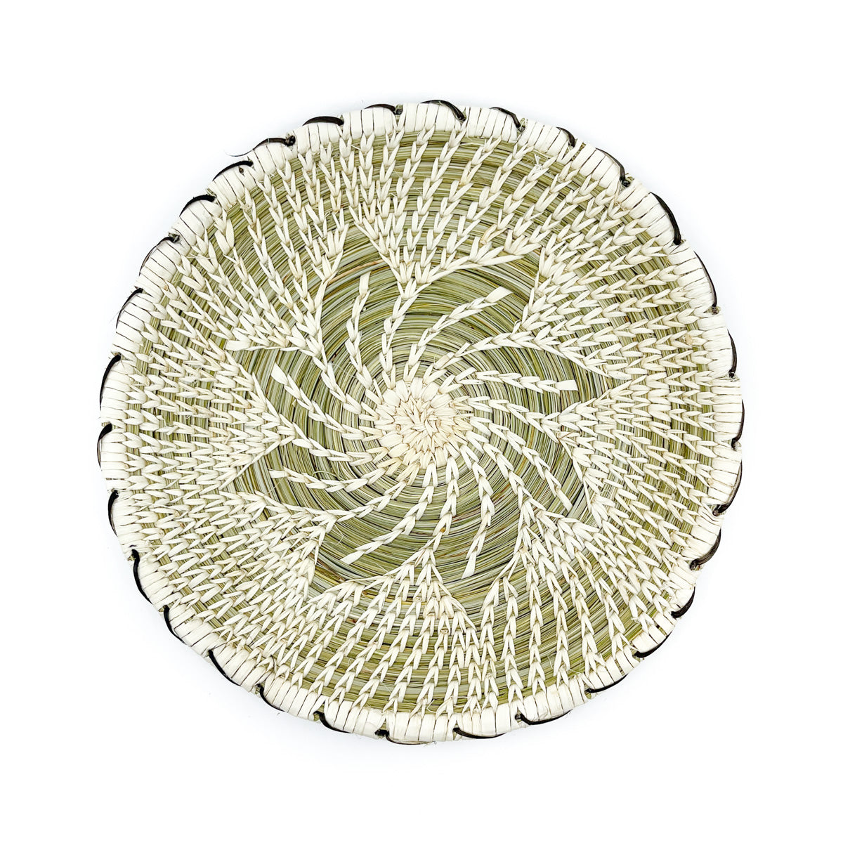 ﻿This handwoven round basket is by Margie Juan and measures approximately 10 inches in diameter.  Plant materials are hand gathered from the Sonoran Desert for basket weaving. The interior green coils (warp) are native Beargrass and the white stitches (weft) woven around the coils are sun-bleached Soaptree Yucca, the black stitching used for the basket edge is Devil's Claw Pod.  Keep away from sunlight to maintain color variations.