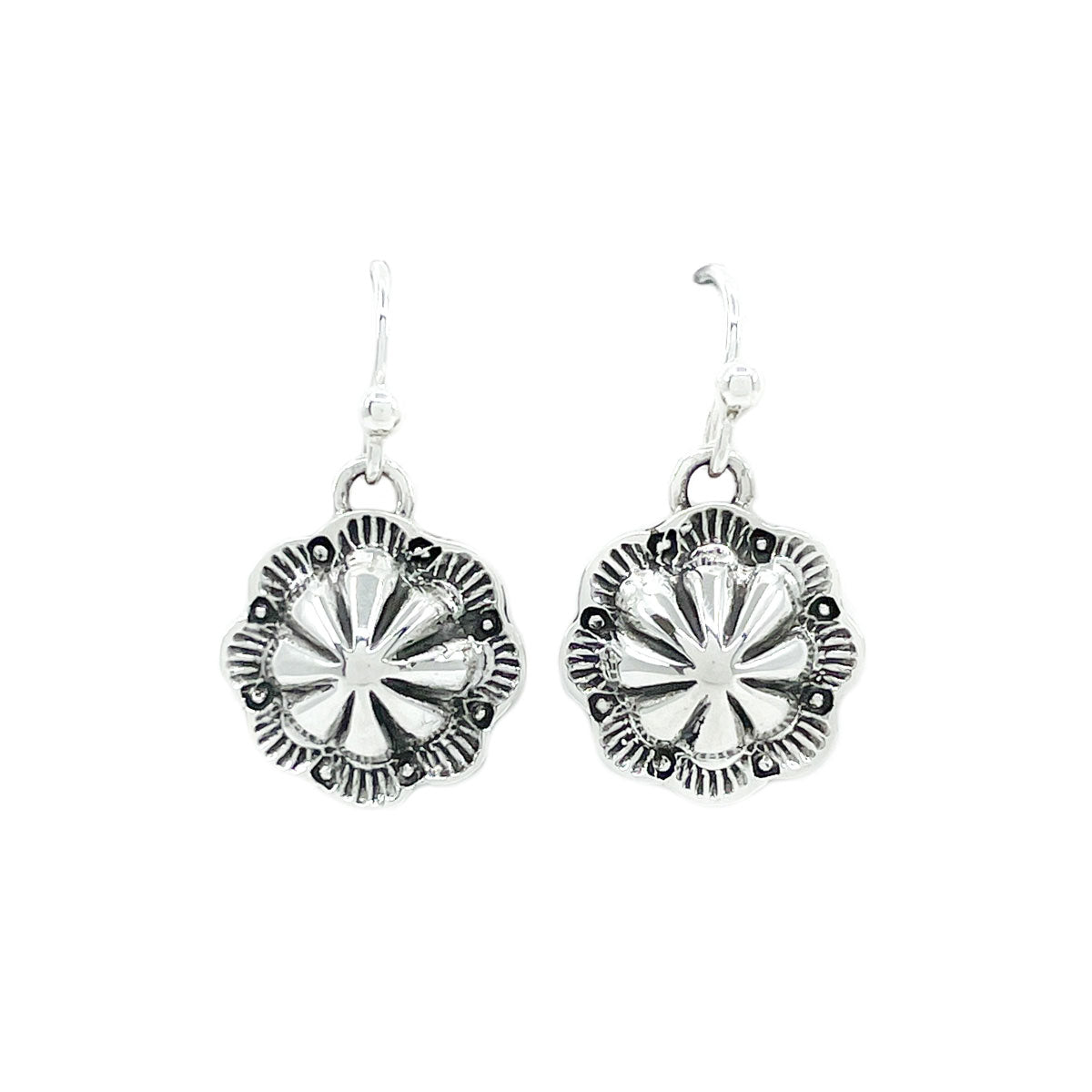 Load image into Gallery viewer, Sterling silver dangling concho blossom earrings by Diné silversmith Raymond Coriz Hand stamped with repousse work and sterling silver wires Measures .50 inches in diameter,  Dangles form ear lobe approx. 1 inch
