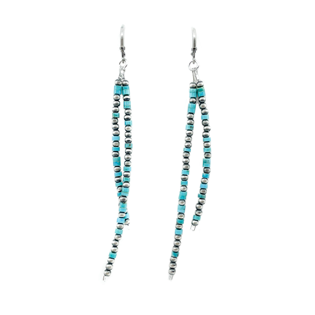 Earrings: Sterling silver lever back ear wires by Esther Reano Turquoise Heishe beads with sterling silver beads Measures approx. 3.25 inches long, dangles 3.5 inches from earlobe