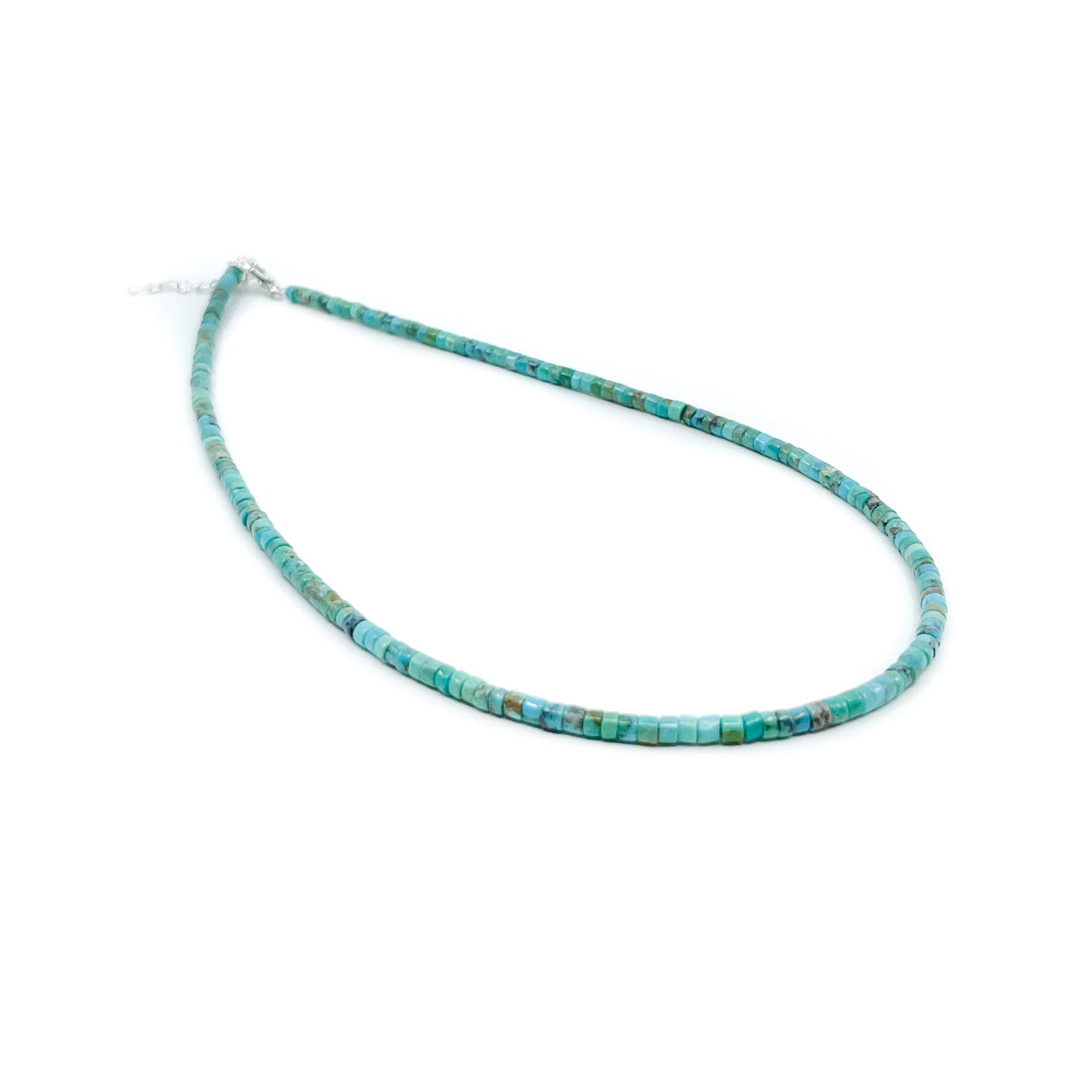 Load image into Gallery viewer, Handmade turquoise heishe bead necklace by Ester Reano, from Kewa Pueblo (Santo Domingo) in New Mexico. Sterling silver lobster claw clasp with high polish finish. Necklace measures 15.5 inches long plus a 2 inch extender is attached to provide a maximum length of 17.5 inches.
