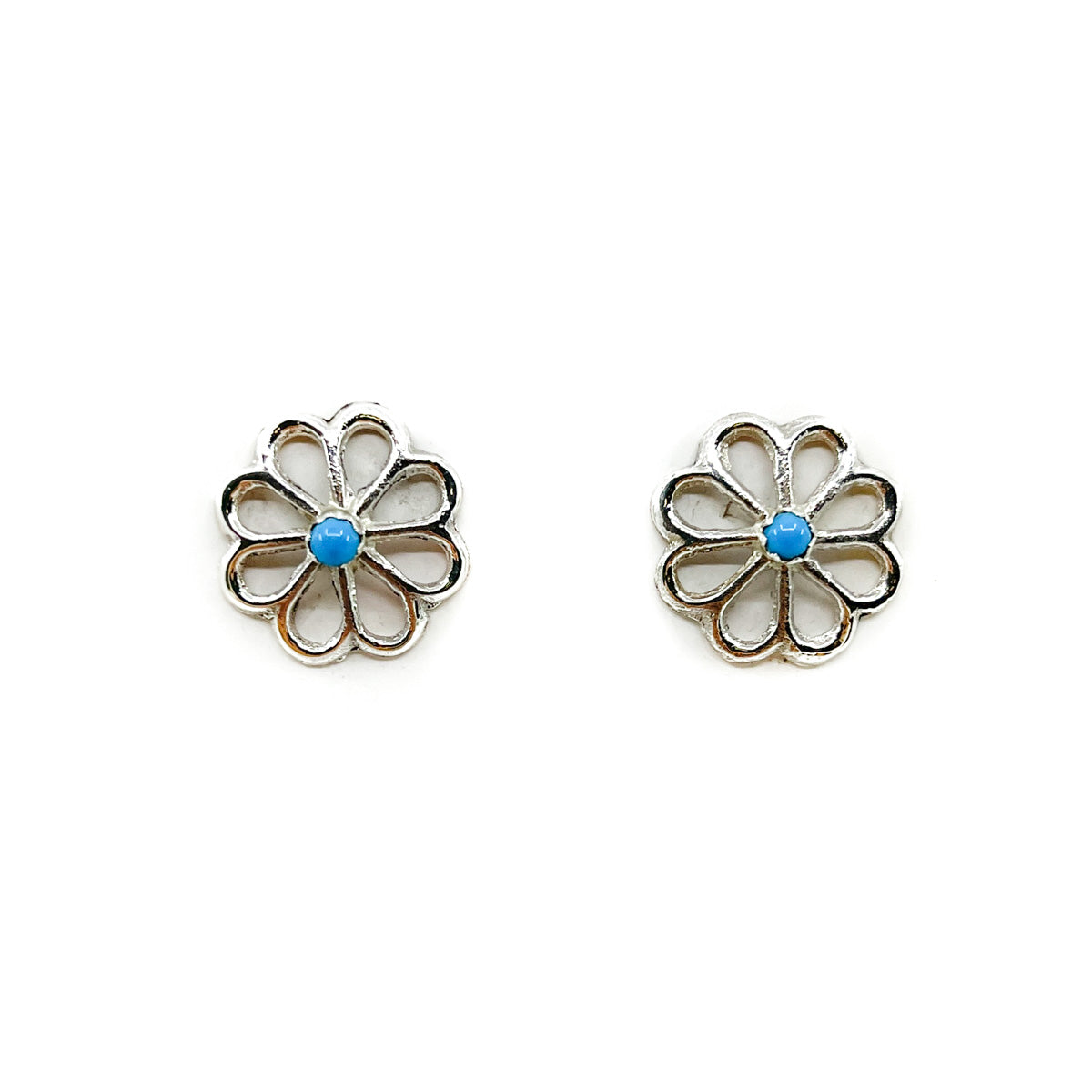 Sterling silver blossom earring with turquoise stone in center By Diné jeweler Bruce Chee Sterling silver posts and backs Measures 5/8 of an inch in diameter *All sales on jewelry are final. No returns or exchanges.
