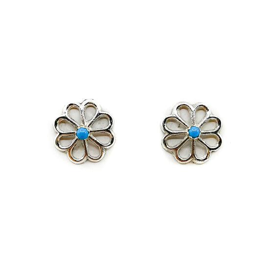Sterling silver blossom earring with turquoise stone in center By Diné jeweler Bruce Chee Sterling silver posts and backs Measures 5/8 of an inch in diameter *All sales on jewelry are final. No returns or exchanges.