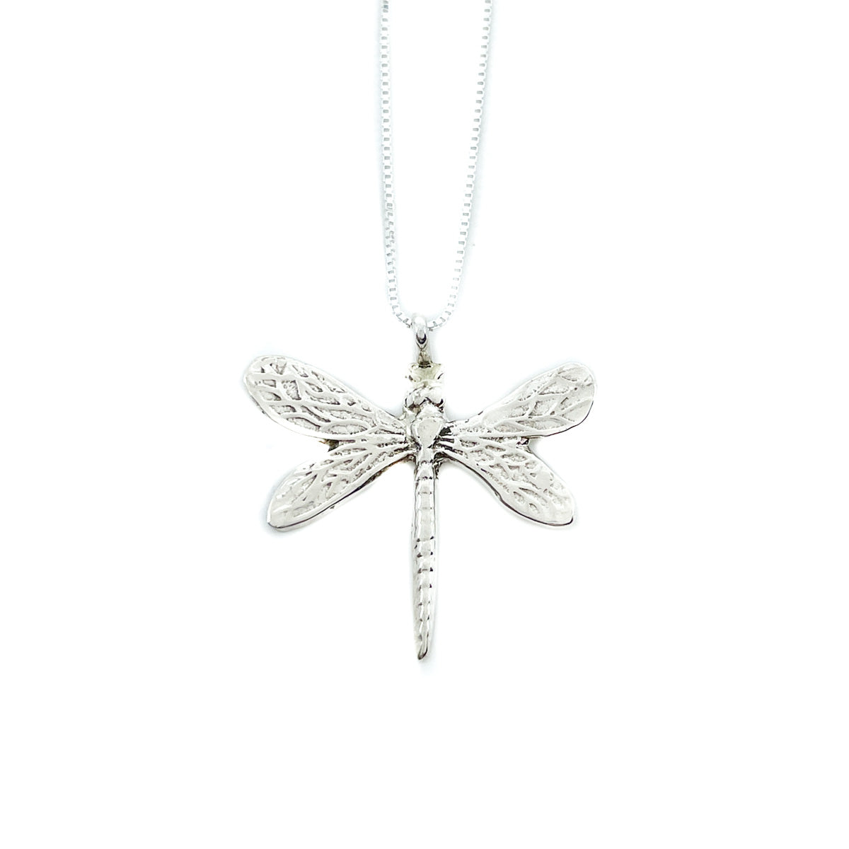 Sterling silver dragonfly pendant with sterling silver chain Pendant measures approx. 1.25 inches long with 1.25 inch wide wingspan 18 inch chain with spring ring clasp
